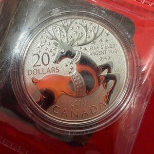 Silver Canadian 20 Dollar Coin with Reindeer Design